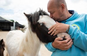 Billy with rescued horse at the Retreat