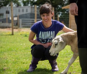 Isoble with rescued sheep at the Retreat