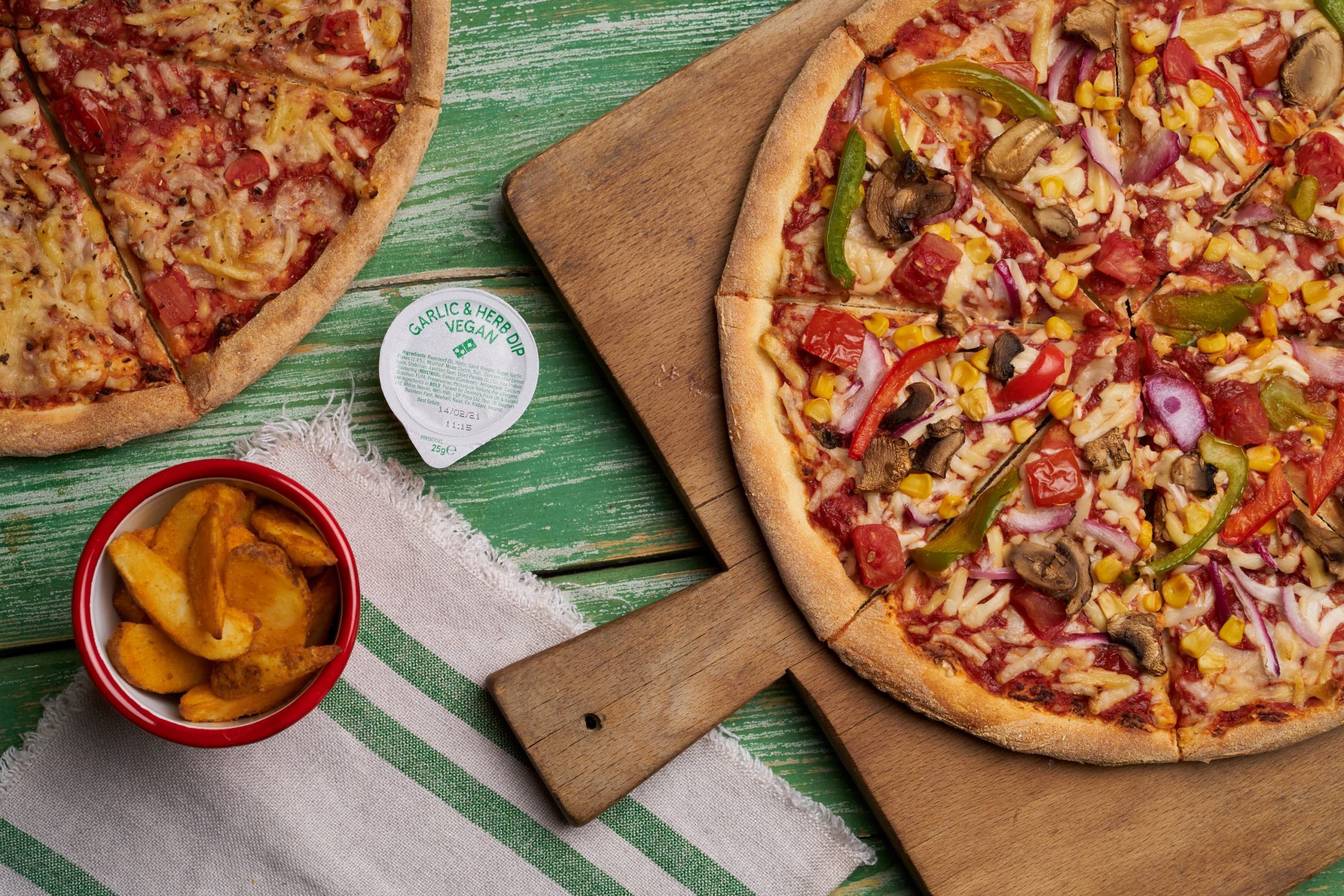 Both new pizzas: The Vegan Margareta (L) and Vegan Vegi Supreme (R). Image: Domino's