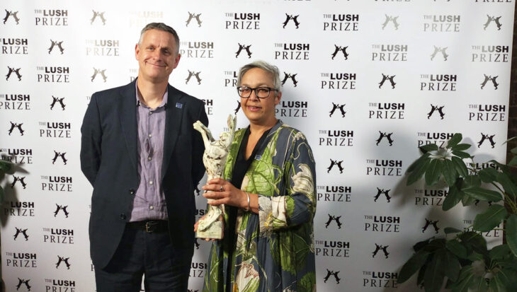 Animal Aid director Iain Green and Head of Campaigns Jessamy Korotoga holding a Lush prize statuette of a hare