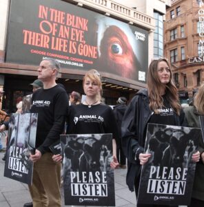 Animal Aid holds peaceful demo in Leicester Square calling on the public to “listen” to the Terror on Our Tables